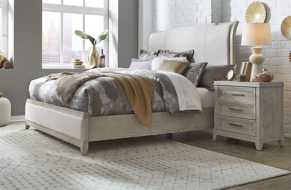 Liberty Furniture Belmar Cal King Upholstered Sleigh Bed in Washed Taupe and Silver Champagne 902-BR-KUB