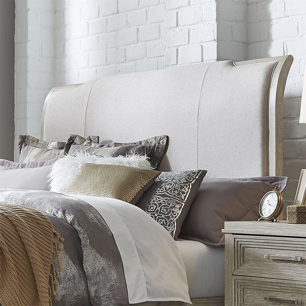 Liberty Furniture Belmar Cal King Upholstered Sleigh Bed in Washed Taupe and Silver Champagne 902-BR-KUB