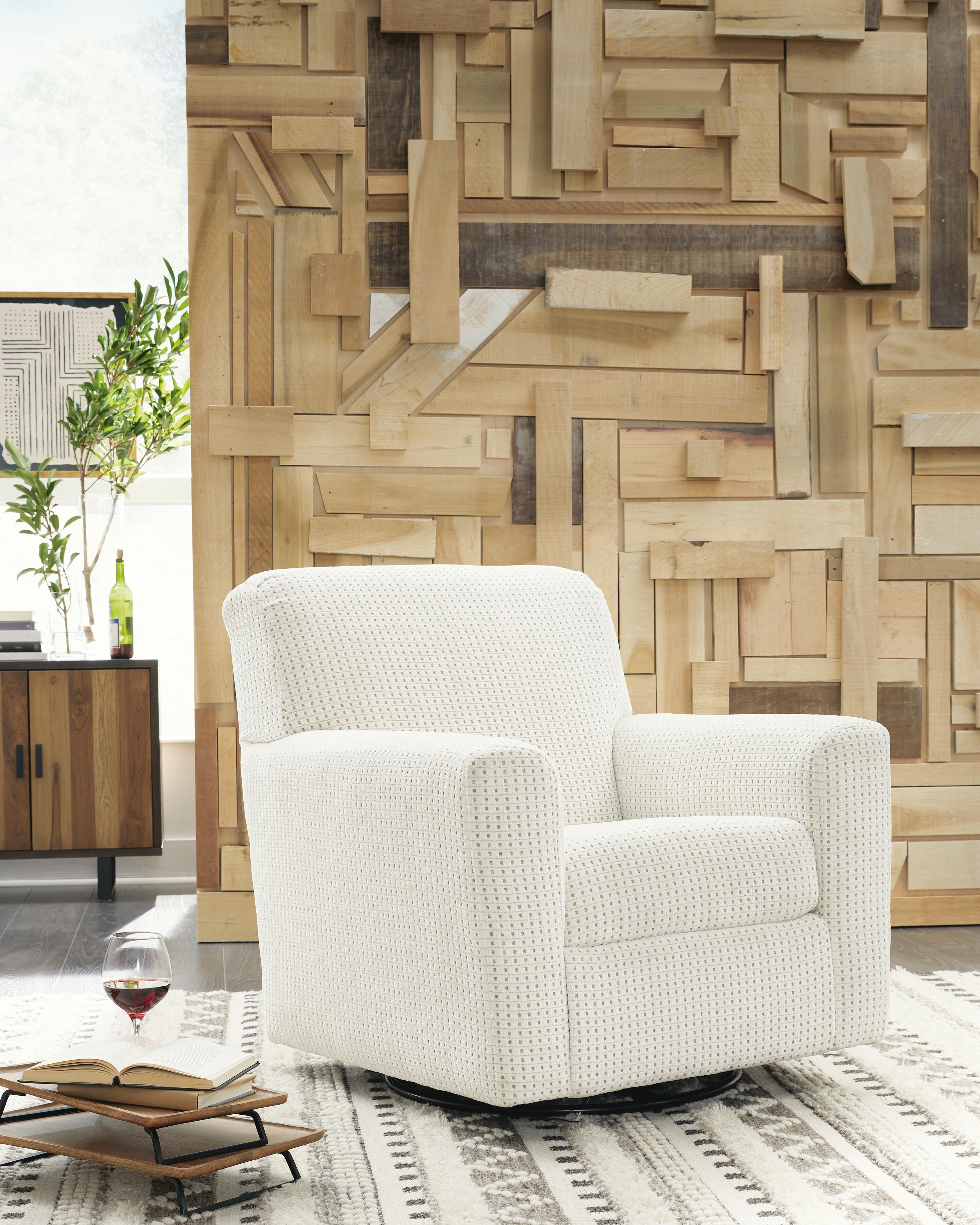 Herstow Swivel Glider Accent Chair - Luxury Home Furniture (MI)
