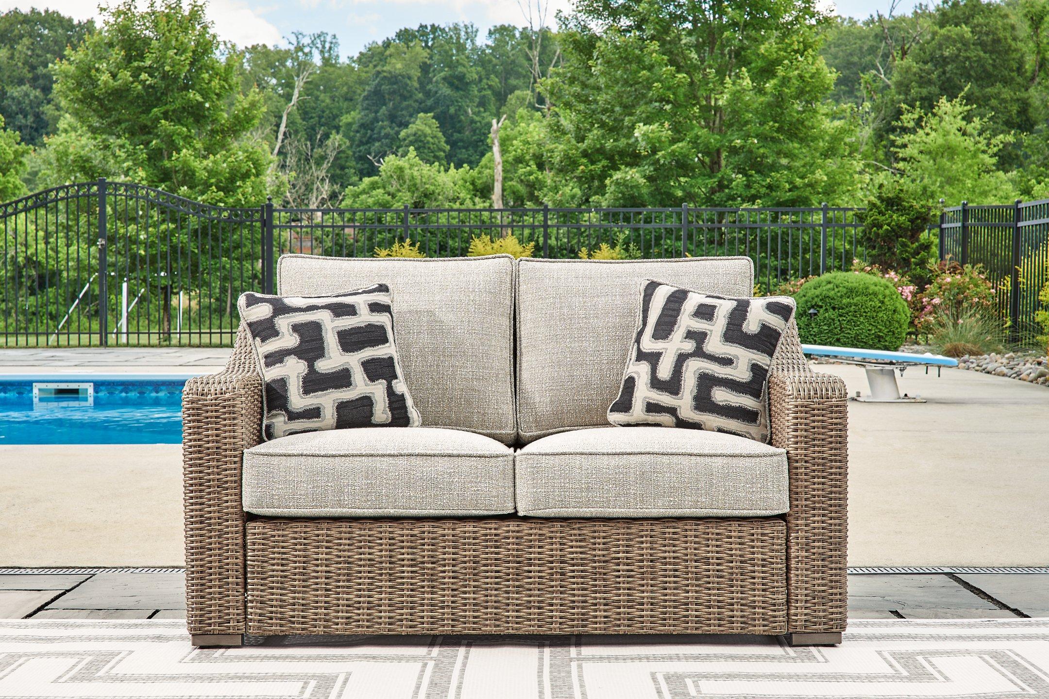 Beachcroft Outdoor Loveseat with Cushion - Luxury Home Furniture (MI)