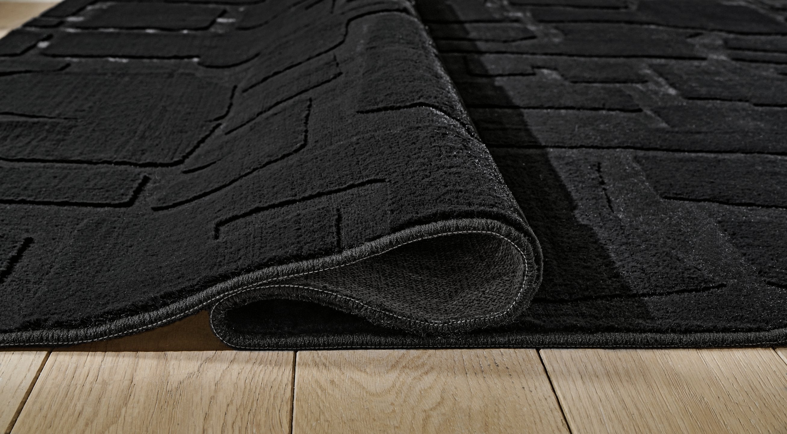 Gibbswell Washable Area Rug - Luxury Home Furniture (MI)