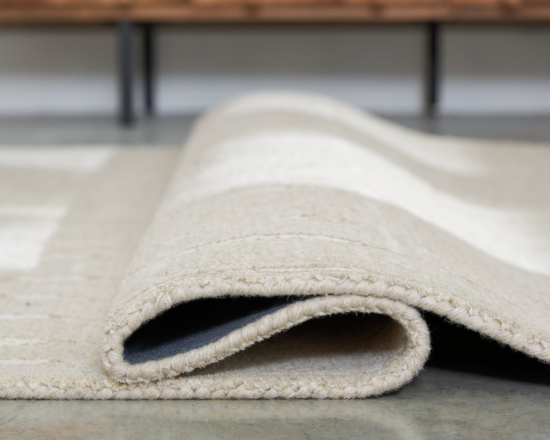 Wolbert 7'8" x 10' Area Rug - Luxury Home Furniture (MI)