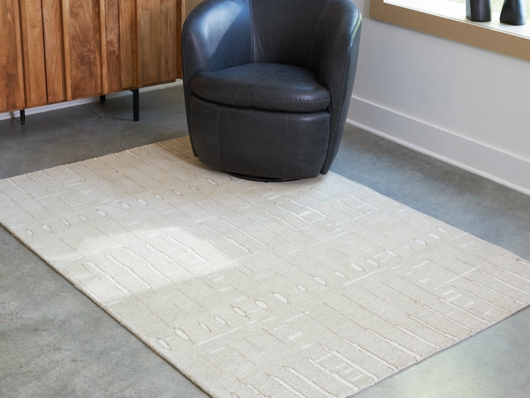 Wolbert 5' x 7' Area Rug - Luxury Home Furniture (MI)