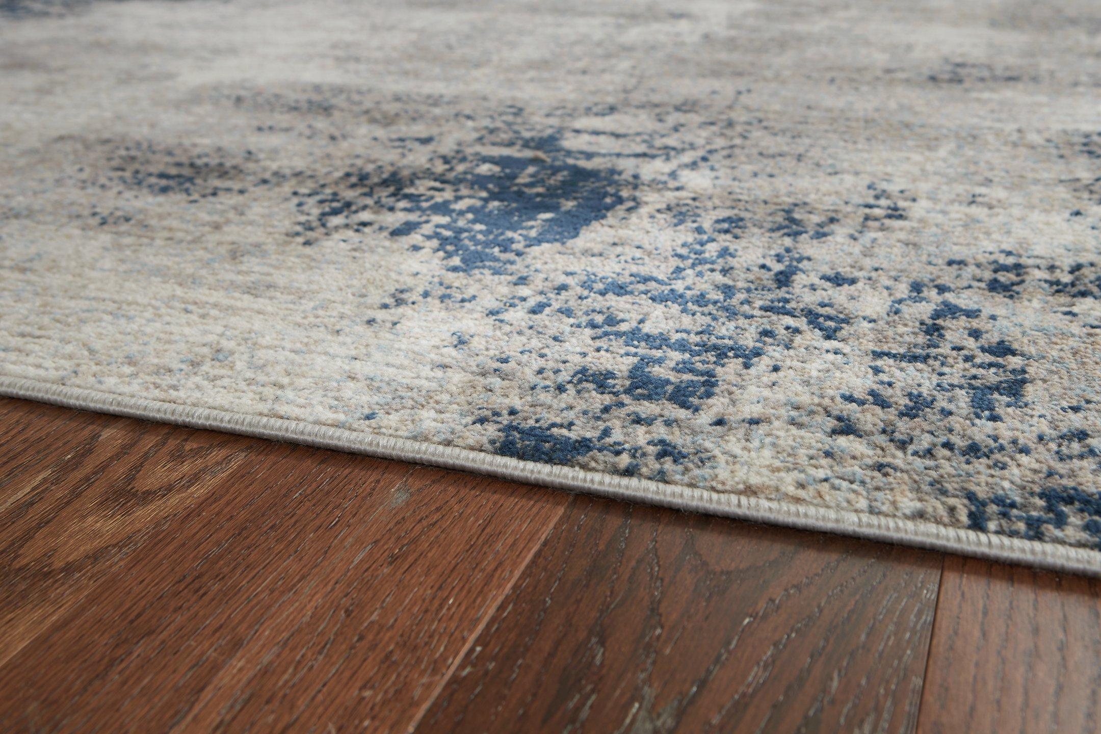 Wrenstow 7'10" x 10'3" Rug - Luxury Home Furniture (MI)