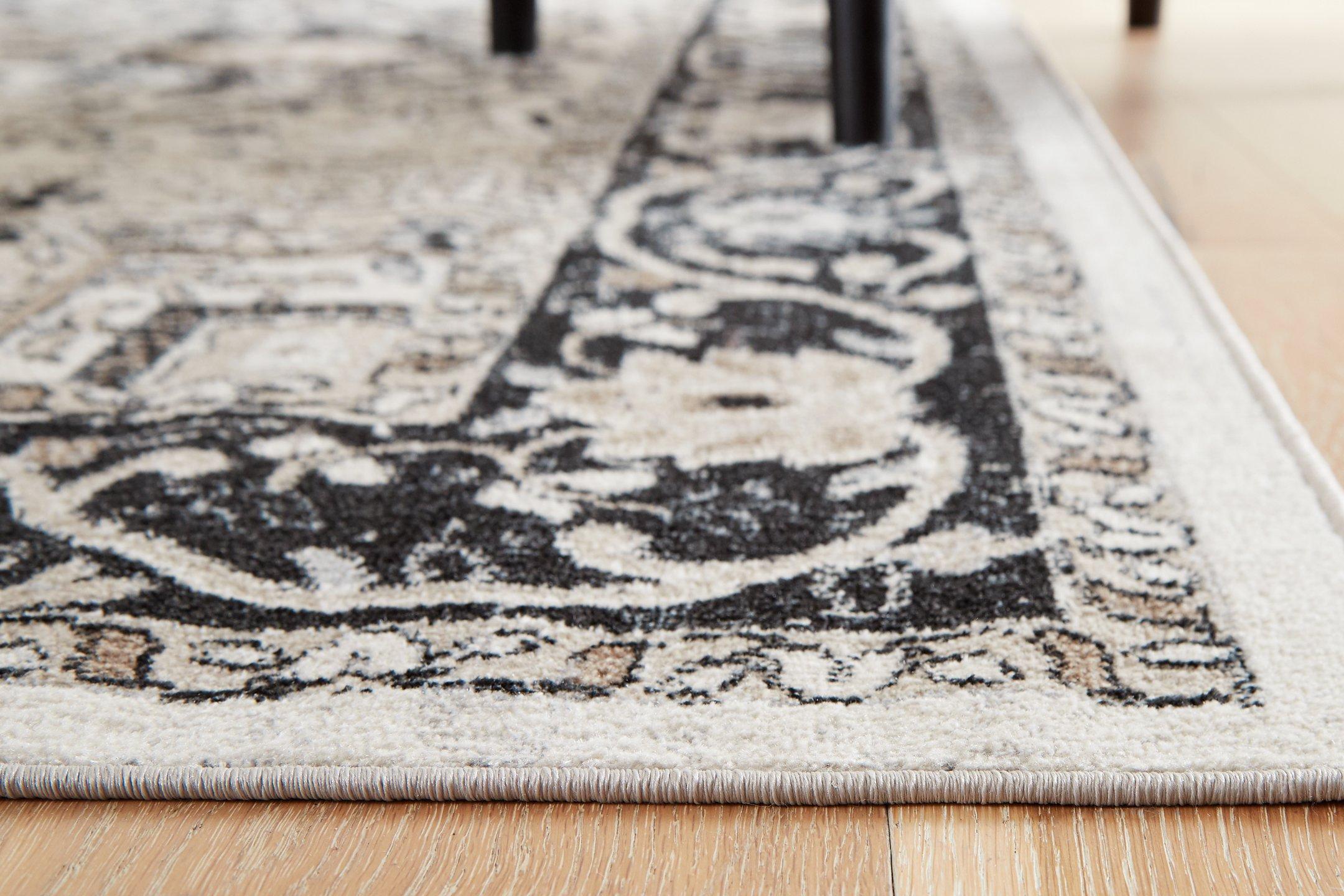 Gregmoore 7'7" x 9'11" Rug - Luxury Home Furniture (MI)
