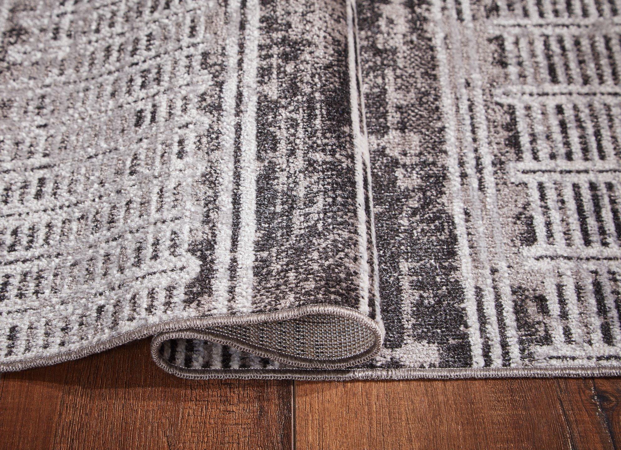 Henchester 8' x 10' Rug - Luxury Home Furniture (MI)