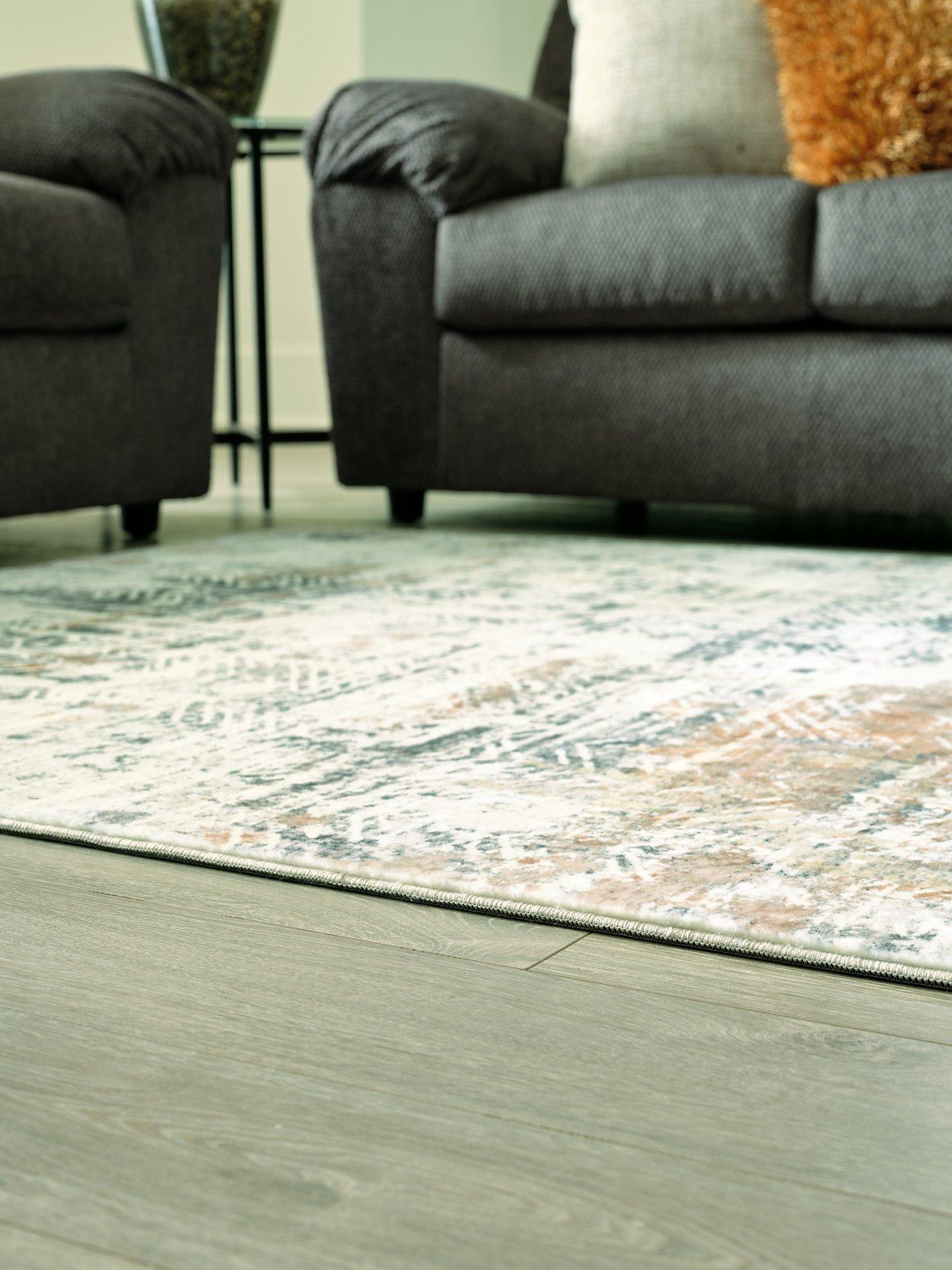 Redlings 7'5" x 9'6" Rug - Luxury Home Furniture (MI)