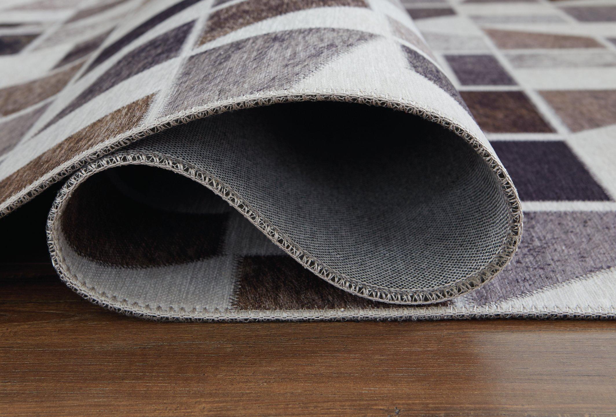Jettner 7'10" x 10' Rug - Luxury Home Furniture (MI)