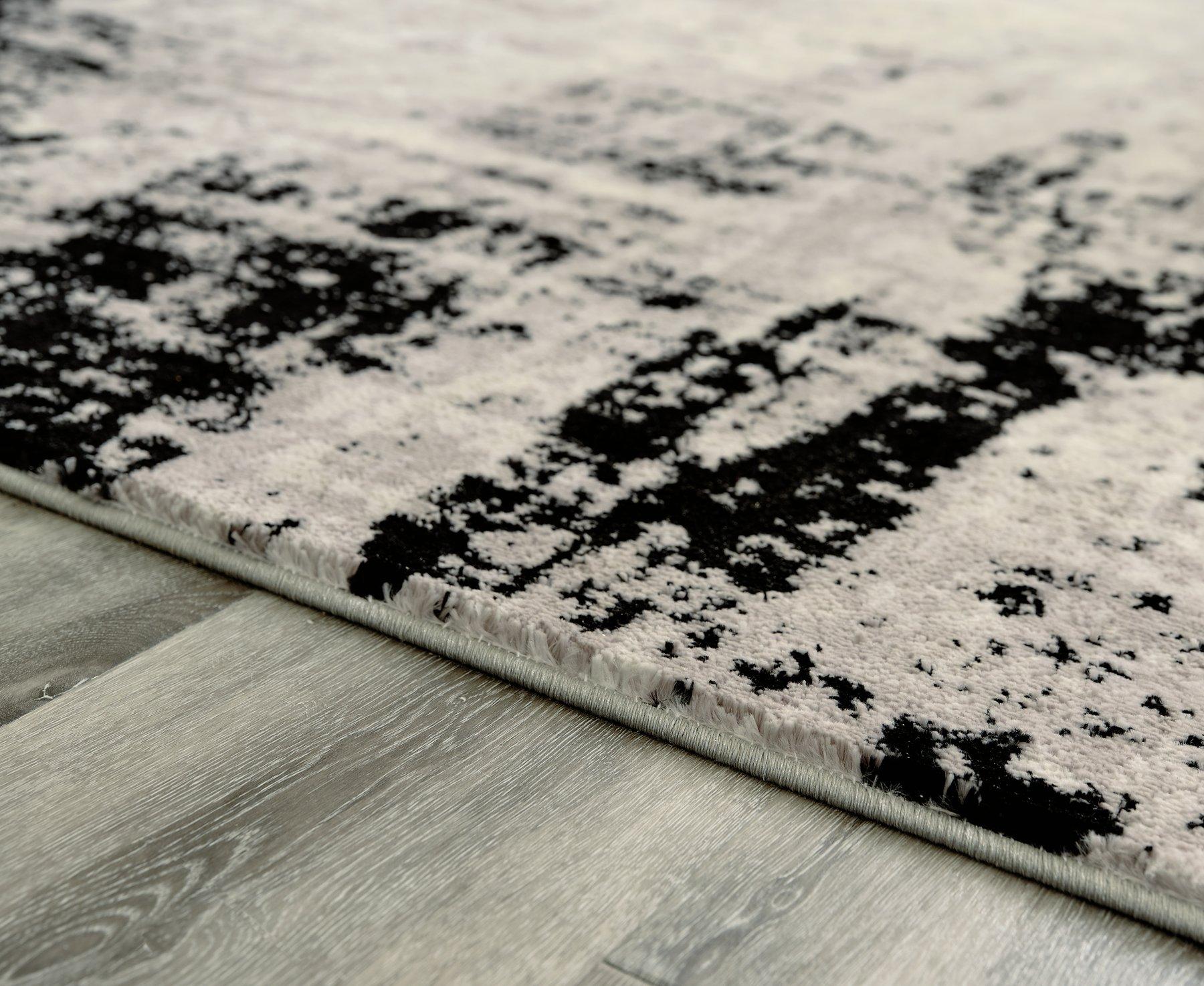 Zekeman 7'10" x 10' Rug - Luxury Home Furniture (MI)