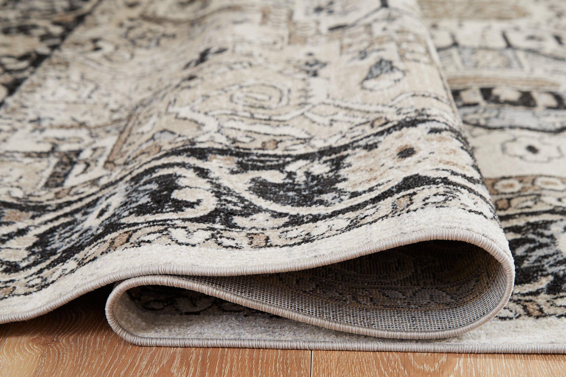 Gregmoore 7'7" x 9'11" Rug - Luxury Home Furniture (MI)