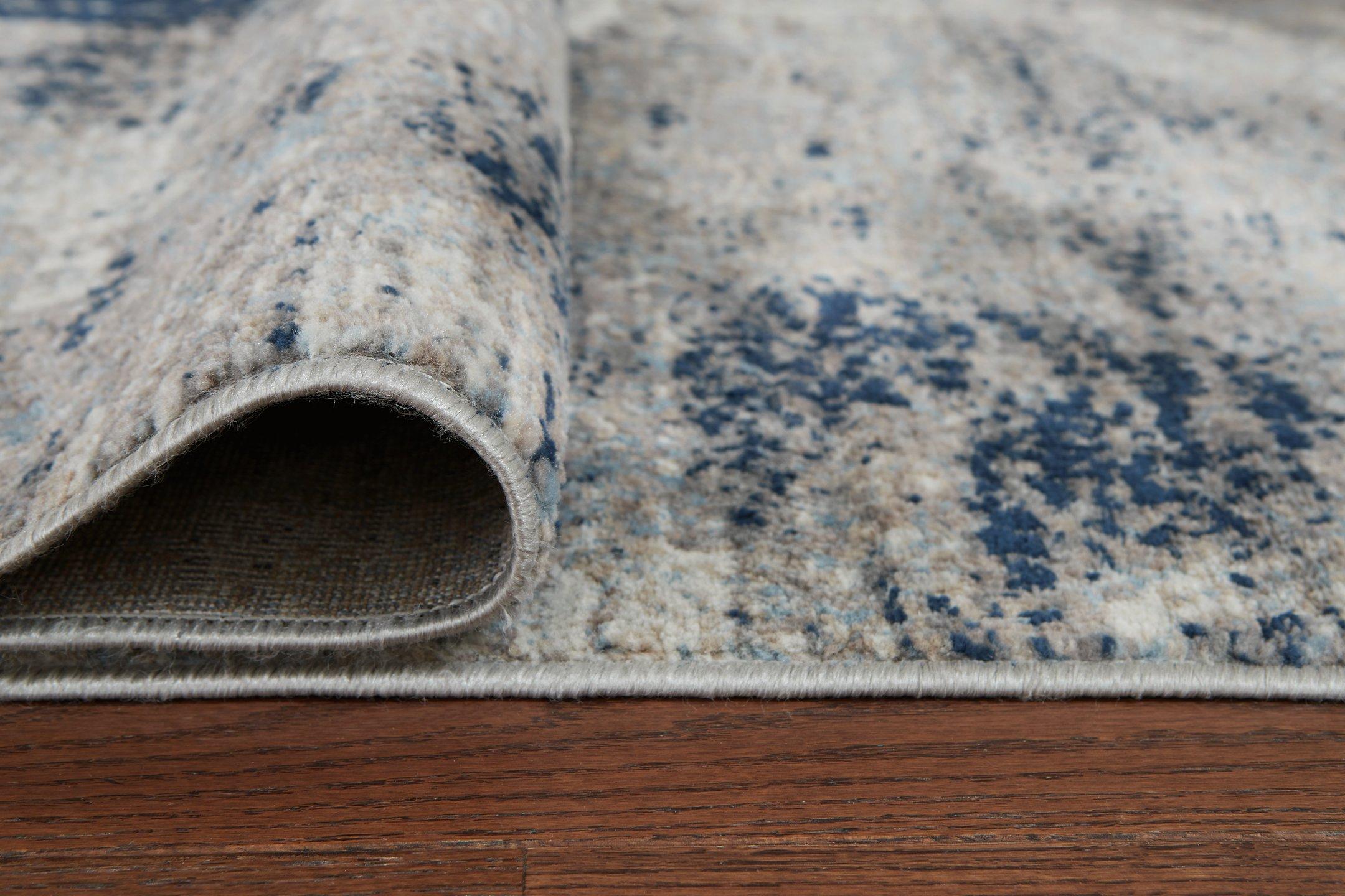 Wrenstow 7'10" x 10'3" Rug - Luxury Home Furniture (MI)