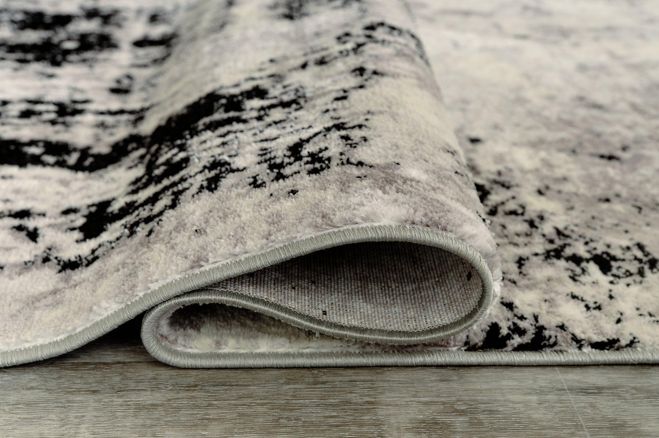 Zekeman 7'10" x 10' Rug - Luxury Home Furniture (MI)