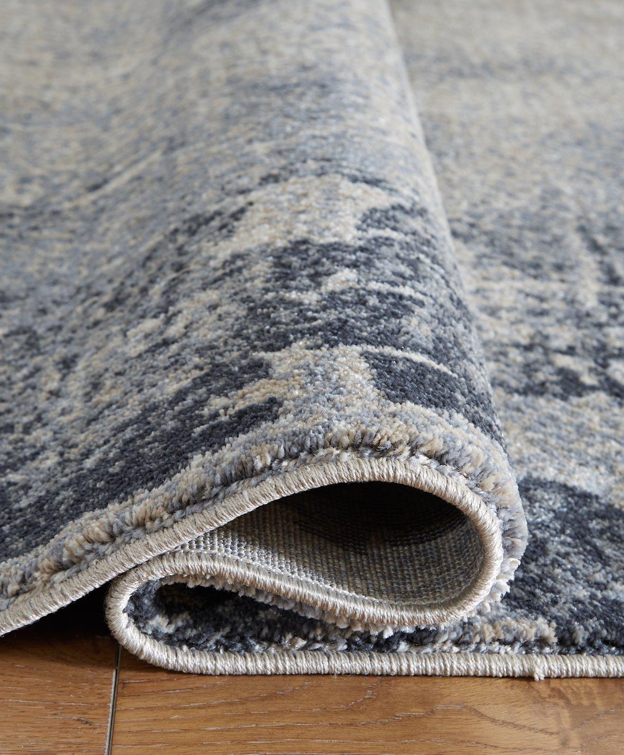 Langrich 7'10" x 10'6" Rug - Luxury Home Furniture (MI)