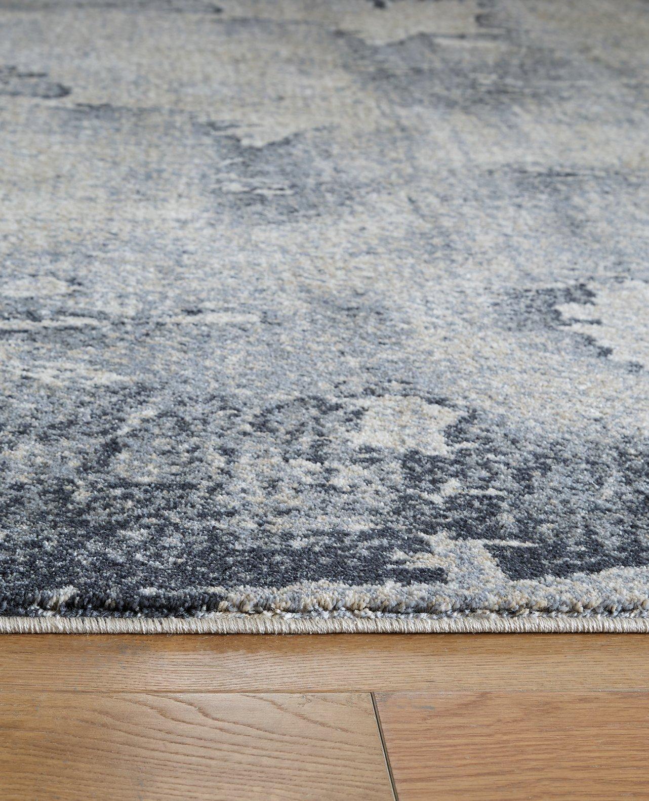 Langrich 7'10" x 10'6" Rug - Luxury Home Furniture (MI)