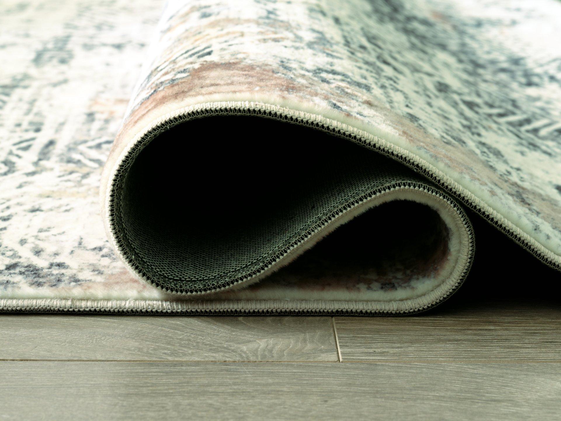 Redlings 7'5" x 9'6" Rug - Luxury Home Furniture (MI)