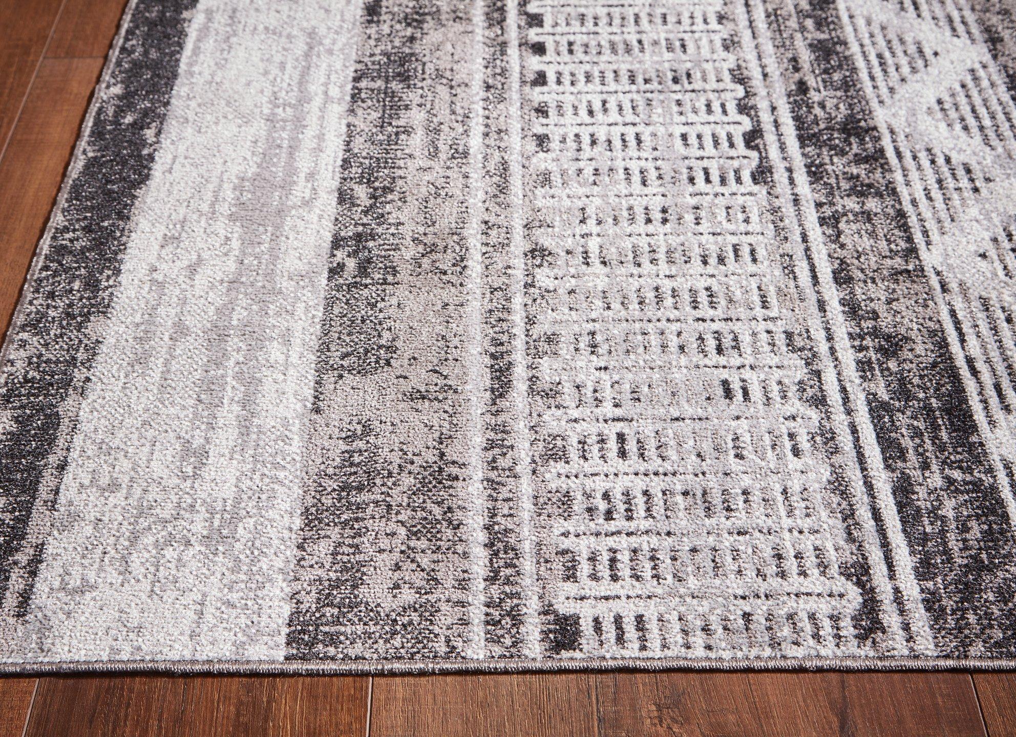 Henchester 8' x 10' Rug - Luxury Home Furniture (MI)