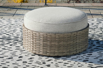 Calworth Outdoor Ottoman with Cushion - Luxury Home Furniture (MI)
