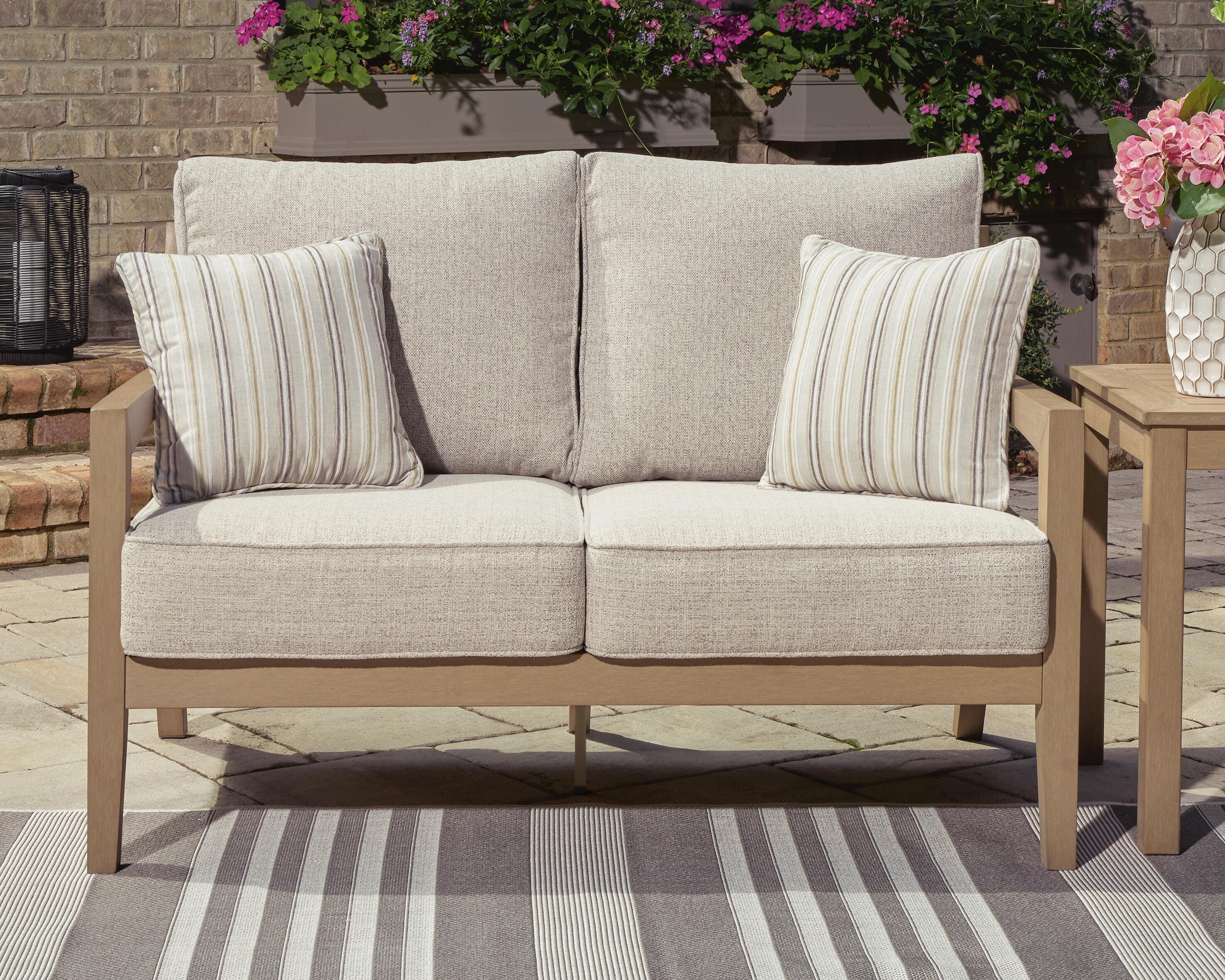 Hallow Creek Outdoor Loveseat with Cushion - Luxury Home Furniture (MI)