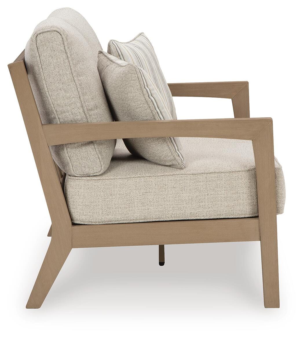 Hallow Creek Outdoor Loveseat with Cushion - Luxury Home Furniture (MI)