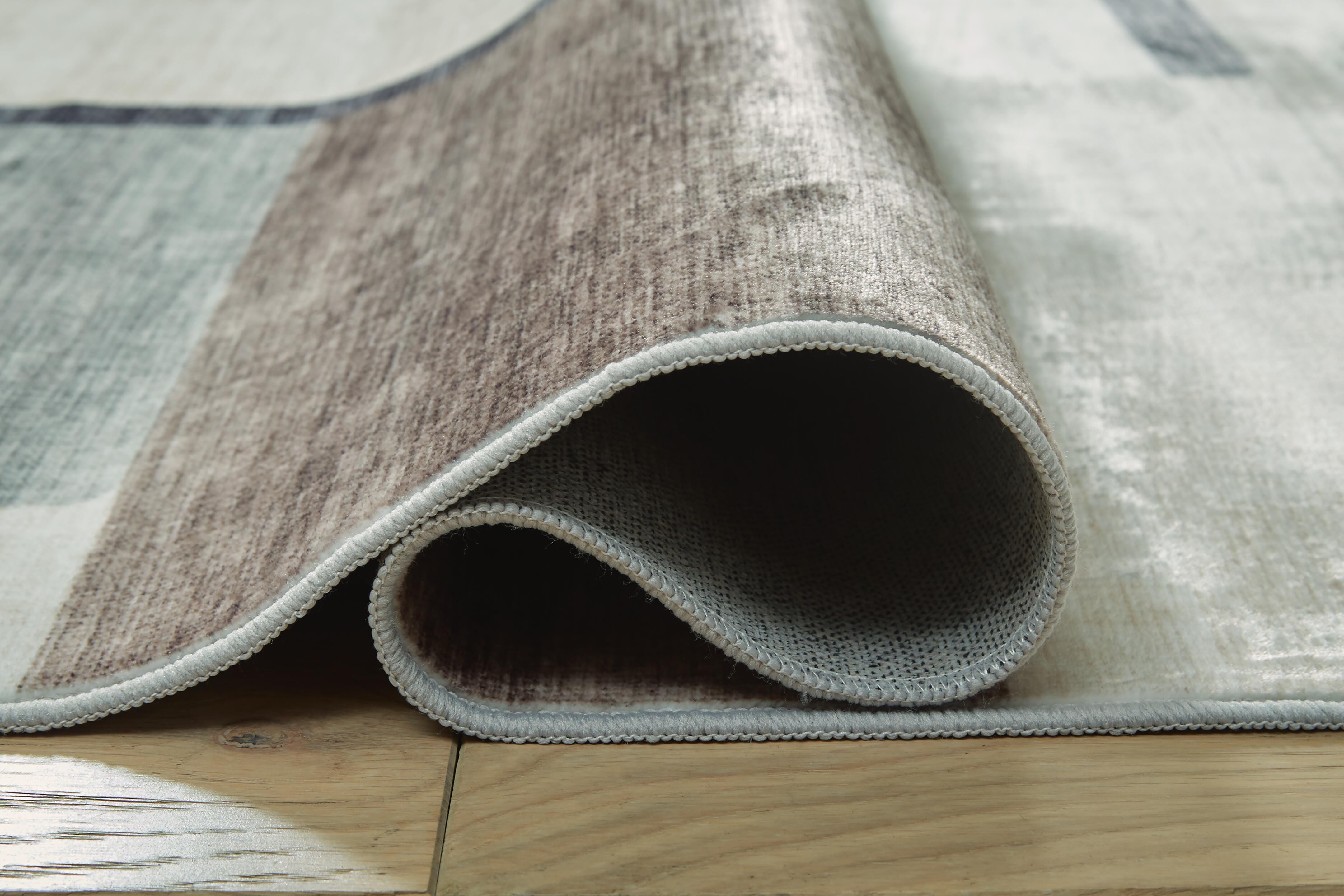 Larkport Washable Area Rug - Luxury Home Furniture (MI)