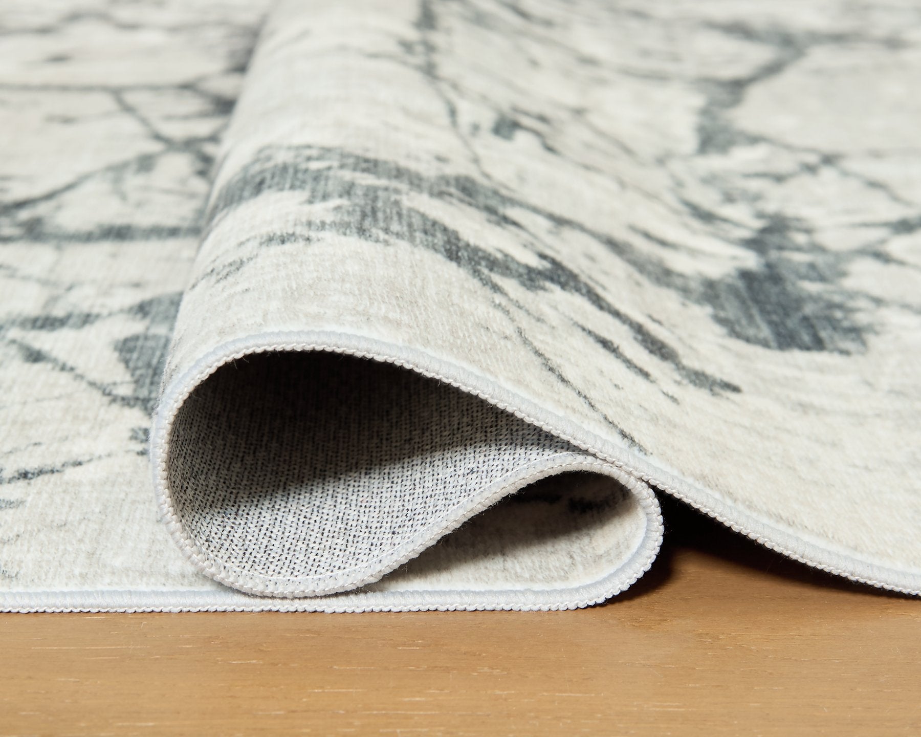 Tobinbury Washable Area Rug - Luxury Home Furniture (MI)