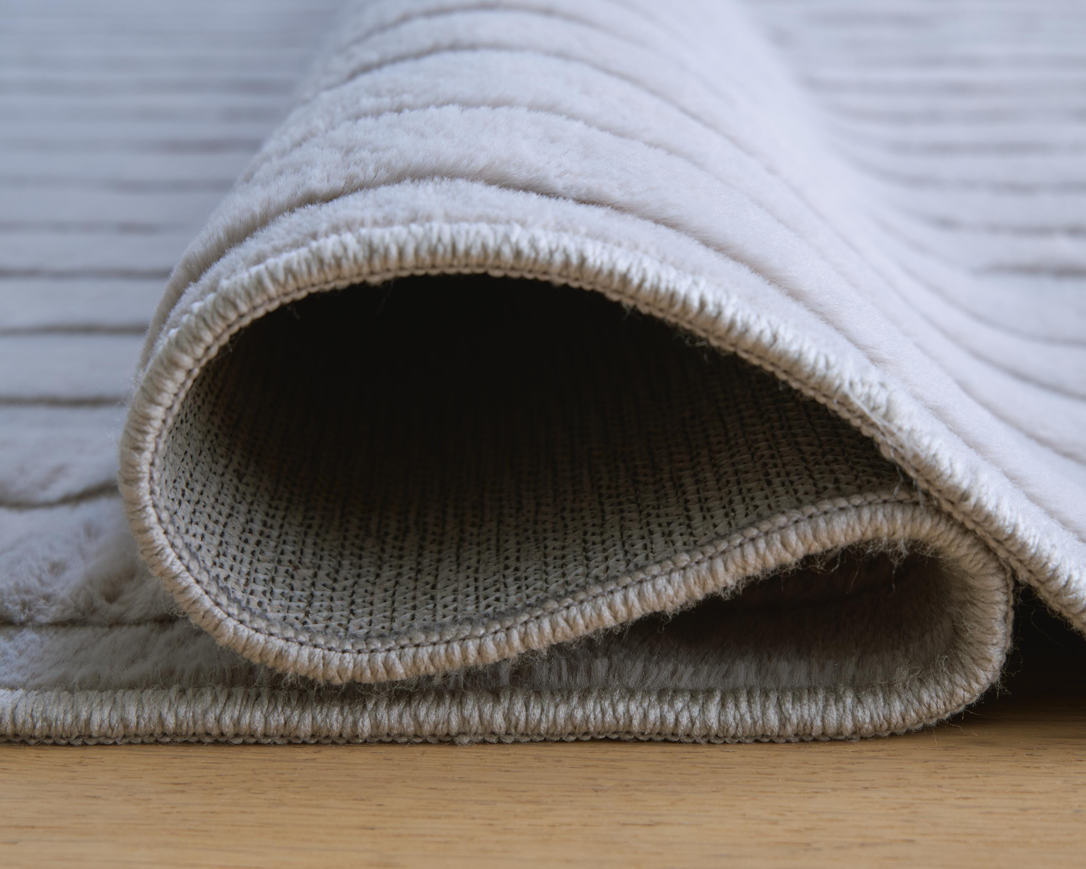 Worthley Washable Area Rug - Luxury Home Furniture (MI)