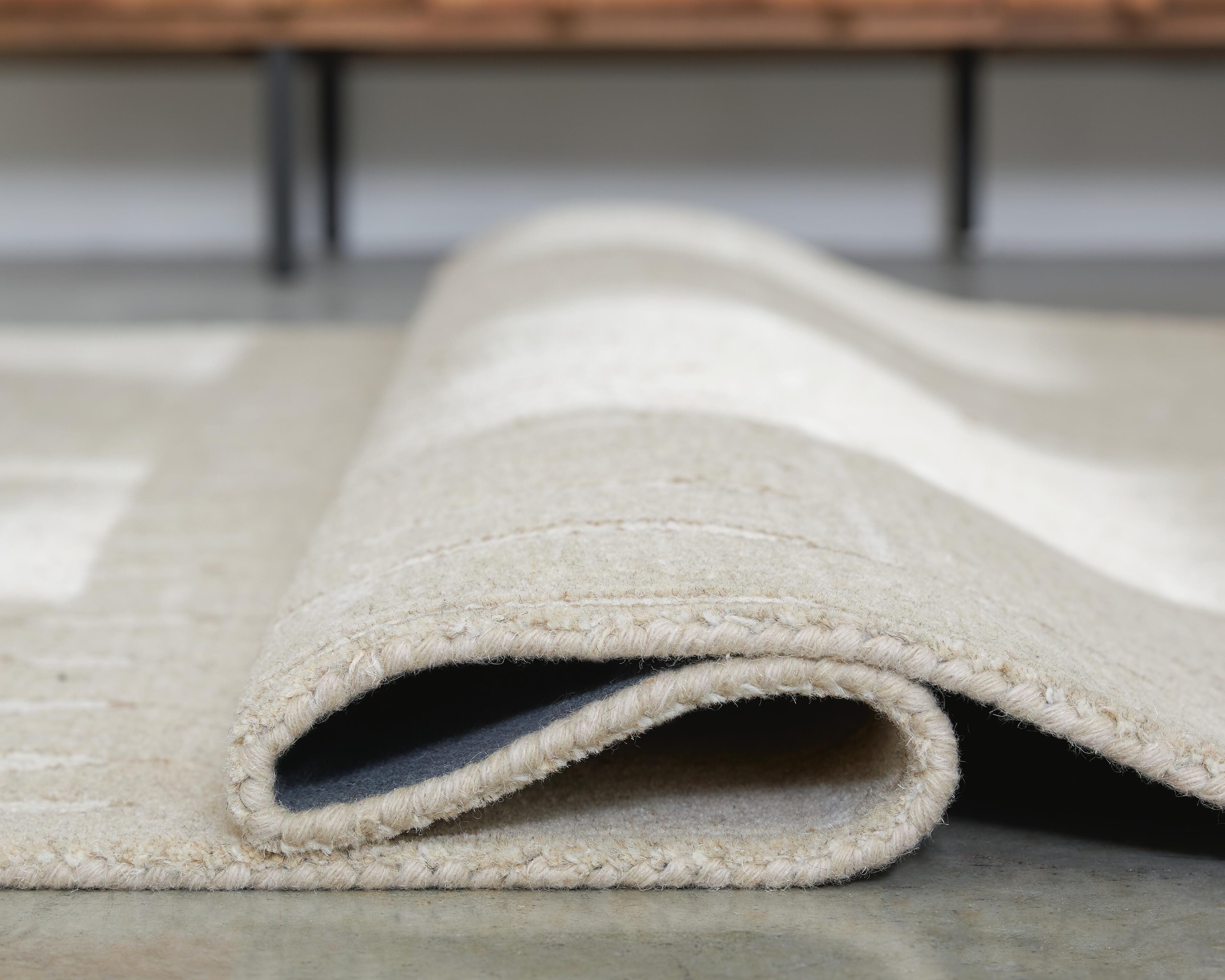 Wolbert 7'8" x 10' Area Rug - Luxury Home Furniture (MI)